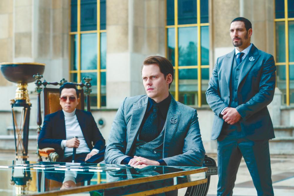 $!Donnie Yen’s Caine (left) is forced to work with the Marquis (centre) to kill John Wick.