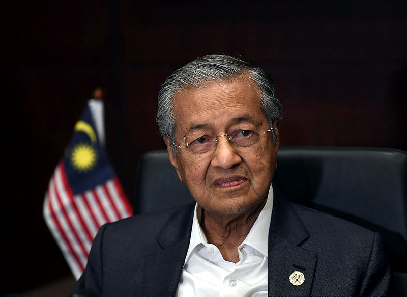 Riot at temple criminal, not racial: Mahathir