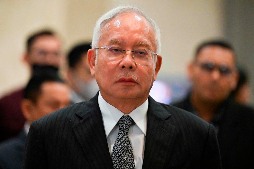 Malaysia former prime minister Najib Razak arrives for a press conference at the federal court in Putrajaya on August 16, 2022. AFPPIX