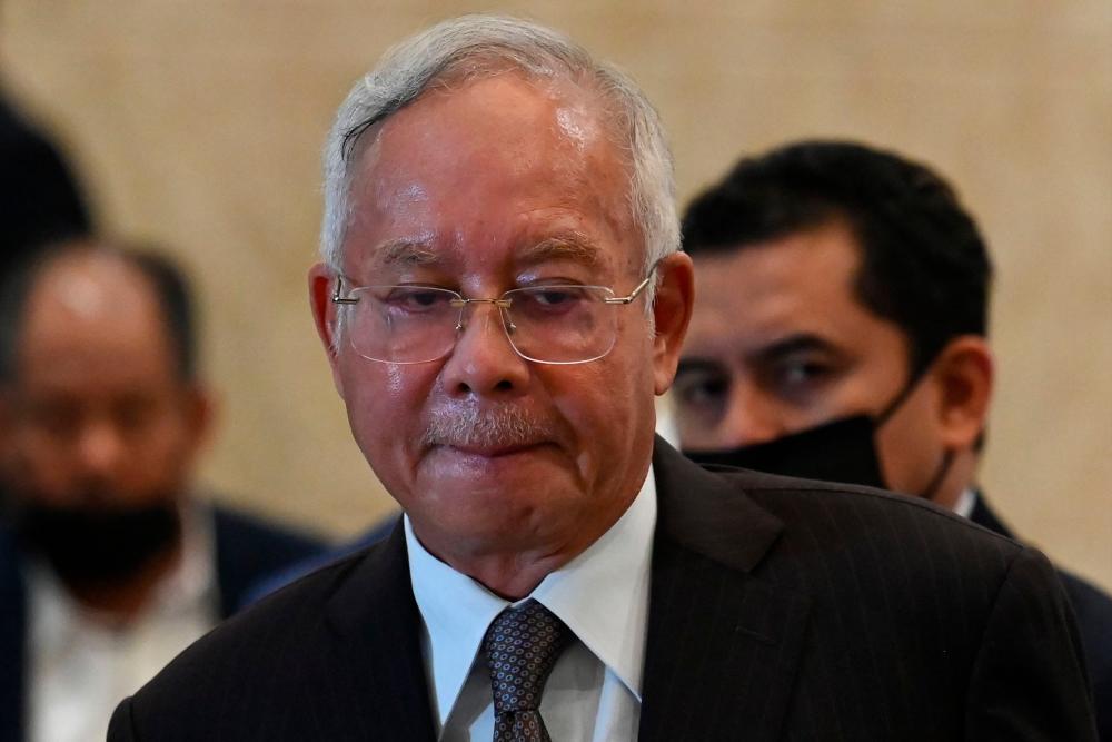 Najib who is currently serving a 12-year jail sentence in Kajang prison for misappropriating SRC International Sdn Bhd’s funds, is charged with using his position to order amendments to the 1MDB final audit report before it was presented to the Public Accounts Committee to avoid any action being taken against him. AFPPIX