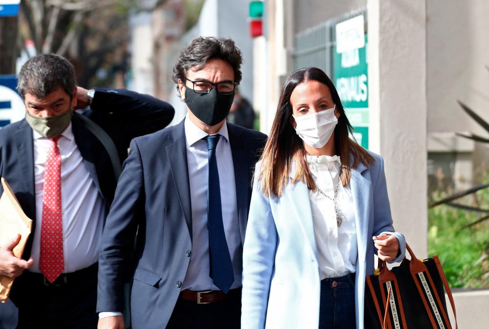 File photo: Agustina Cosachov, psychiatrist of late Argentine football legend Diego Armando Maradona arrives to a prosecutor's office in San Isidro, accompanied by her lawyer, Vadim Mischanchuk, in Buenos Aires, Argentina June 25, 2021. REUTERSpix