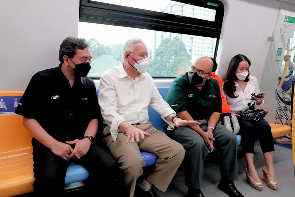 Former prime minister Datuk Seri Najib Abdul Razak and several family members get a special ride on the first phase of the Putrajaya MRT line yesterday, a day before Prime Minister Datuk Seri Ismail Sabri officially opened the line. – Najib Razak Facebook pic.