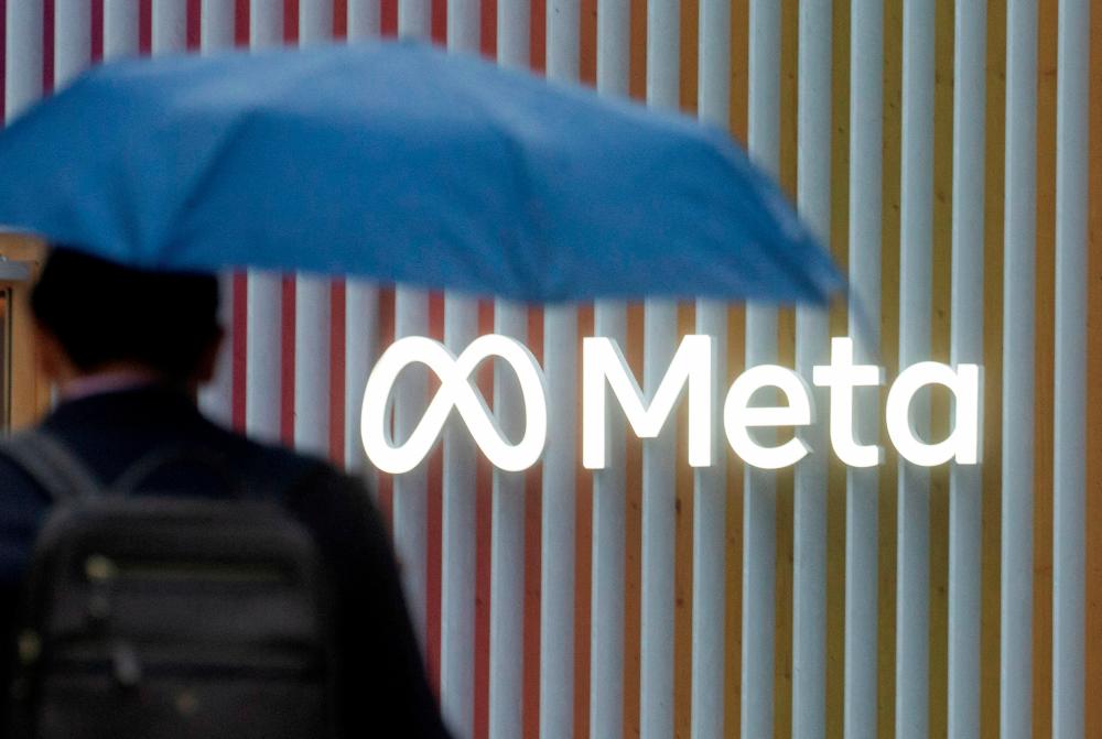 The logo of Meta Platforms is seen in Davos, Switzerland, in May 2022. – Reuters