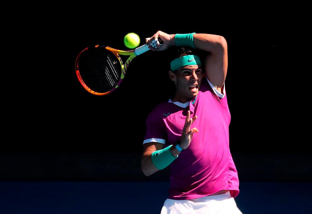Tennis - Australian Open - Melbourne Park, Melbourne, Australia - January 17, 2022Spain's Rafael Nadal in action during his first round match against Marcos Giron of the US. REUTERSPix