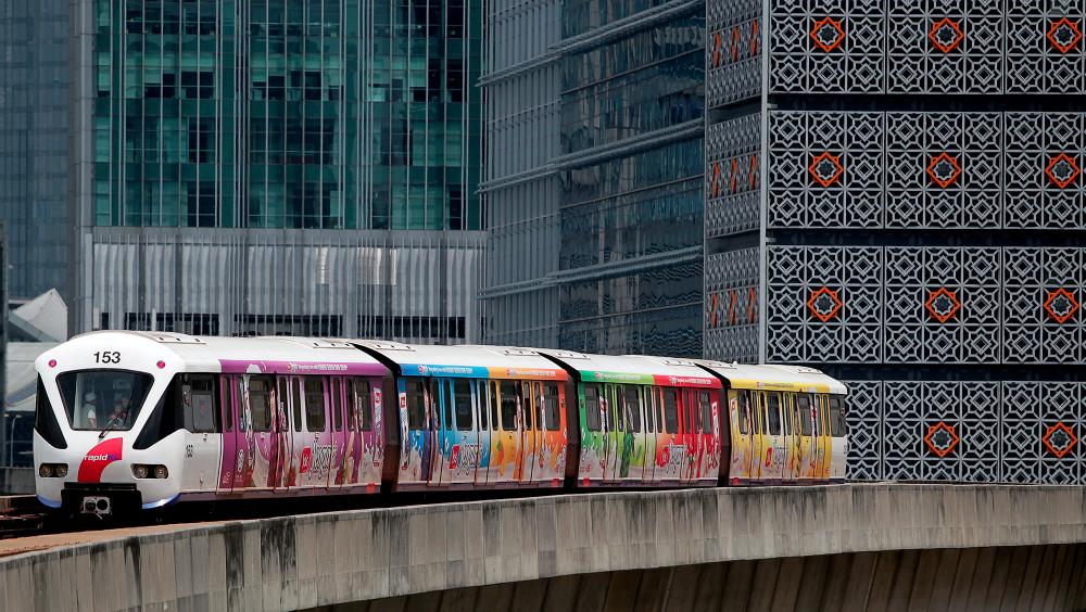 An LRT train departs from the Bangsar LRT Station, Bangsar on Nov 2, 2015. — Sunpix by Norman Hiu