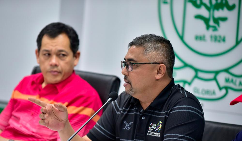 FAM secretary-general, Noor Azman Rahman (right in black shirt) speaking during the local organising committee meeting of the 2019 Asian Cup qualifiers match. - Football Association of Malaysia (FAM)/FBPIX