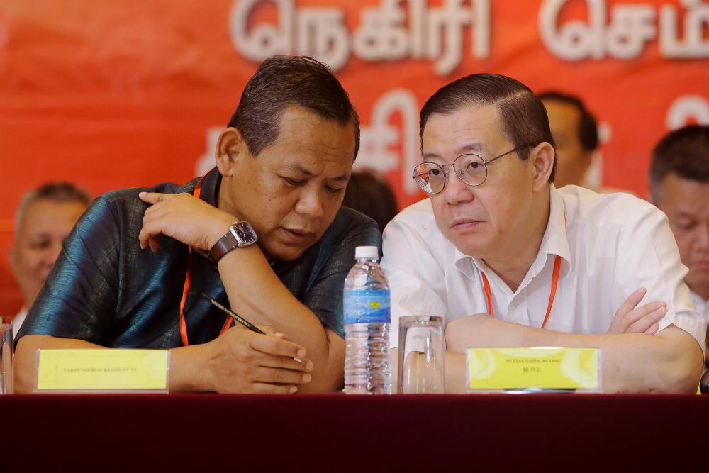 DAP secretary-general, Lim Guan Eng (R) and Negri Sembilan Mentri Besar Datuk Seri Aminuddin Harun, during the 20th Negri Sembilan DAP Annual Convention, in Seremban, on Sept 22, 2019. — Bernama