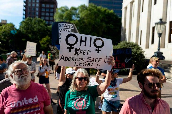 An abortion rights protester holds a sign to keep abortion safe in Ohio at a rally in Columbus, Ohio, after the United States Supreme Court ruled in the Dobbs v Women’s Health Organization abortion case, overturning the landmark Roe v Wade abortion decision, June 24, 2022. REUTERSpix