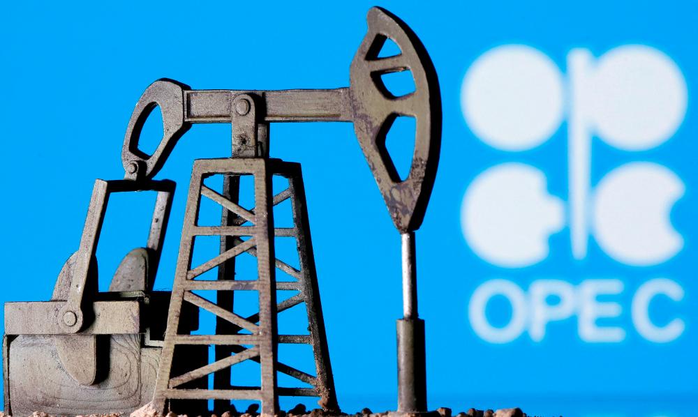 A 3D-printed oil pump jack is seen in front of the Opec logo in this illustration picture. Opec and its allies will raise their output target by 100,000 barrels per day in September – Reuterspix