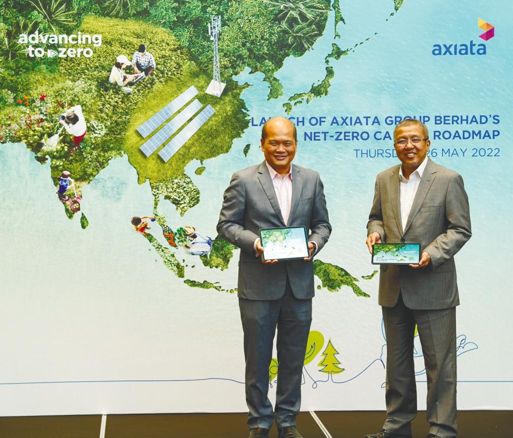 Axiata chairman Tan Sri Shahril Ridza Ridzuan (left) and Izzaddin at the launch of Axiata’s Net Zero Carbon Roadmap.