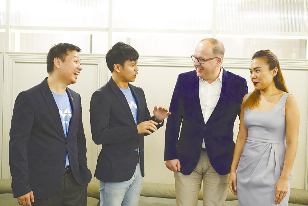 From left: MHub co-founder and chief experience officer Jason Ding, Quek, Chmiel and Juwai.com head of Southeast Asia Shereen Wong. –NORMAN HIU/theSUN