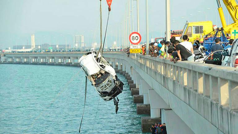 The SUV was hoisted out of the sea by crane on Jan 22, 2019.