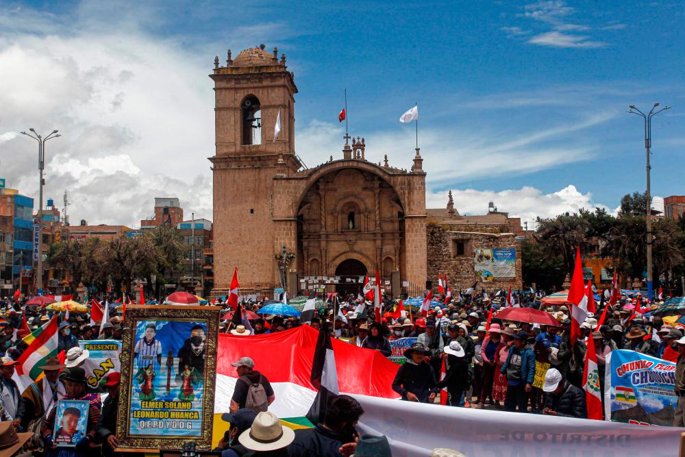 Demonstrators hold a protest against the government of Peruvian President Dina Boluarte and to demand her resignation, in Juliaca, southern Peru, on January 27, 2023. AFPPIX