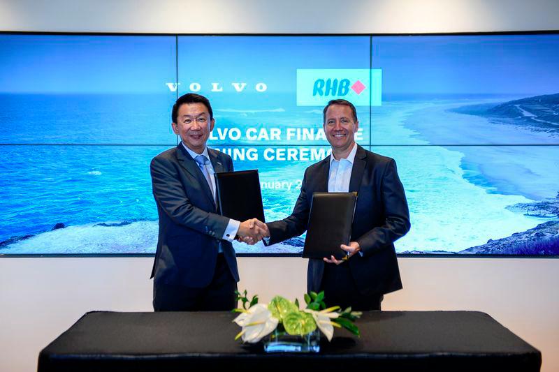 Frump (right) and RHB Banking Group director of group community during the MoU signing ceremony to launch Volvo Car Finance.