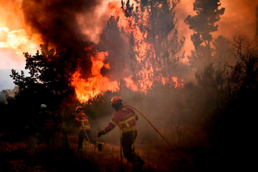Data from Europe’s Copernicus satellite system showed as much as 12,000 hectares had been affected by the blaze across the affected province of Caceras. AFPPIX