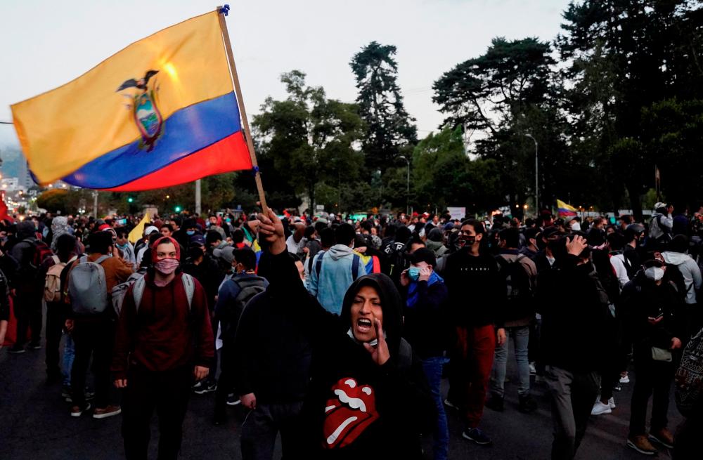 People protest against President Guillermo Lasso's economic and environmental policies and in support of Indigenous leader Leonidas Iza and other demonstrators arrested. - REUTERSPIX