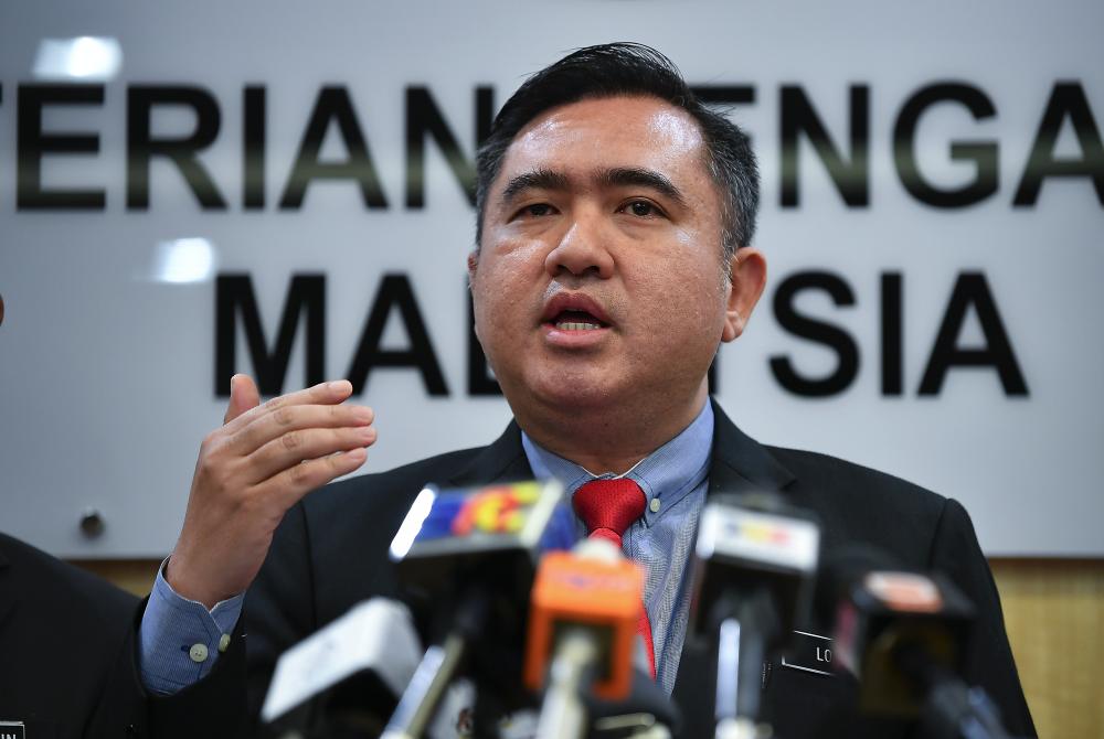 Transport Minister Anthony Loke Siew Fook speaks at a press conference at the Transport Ministry in Putrajaya. - Bernama