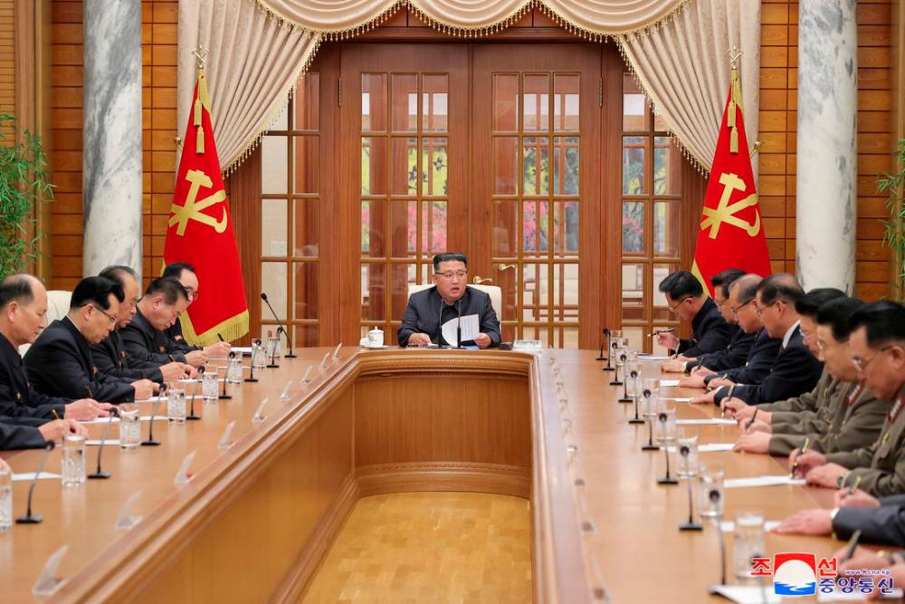 North Korean leader Kim Jong Un attends the 11th Meeting of the Political Bureau of the 8th Central Committee in this undated photo released on December 1, 2022. REUTERSPIX