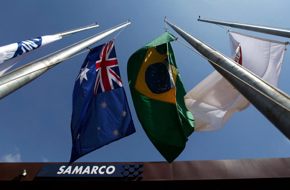 An Australian and a Brazilian flag are pictured at the entrance of the mine operator Samarco owned by Vale SA and BHP Billiton Ltd in Mariana, Brazil. REUTERSpix