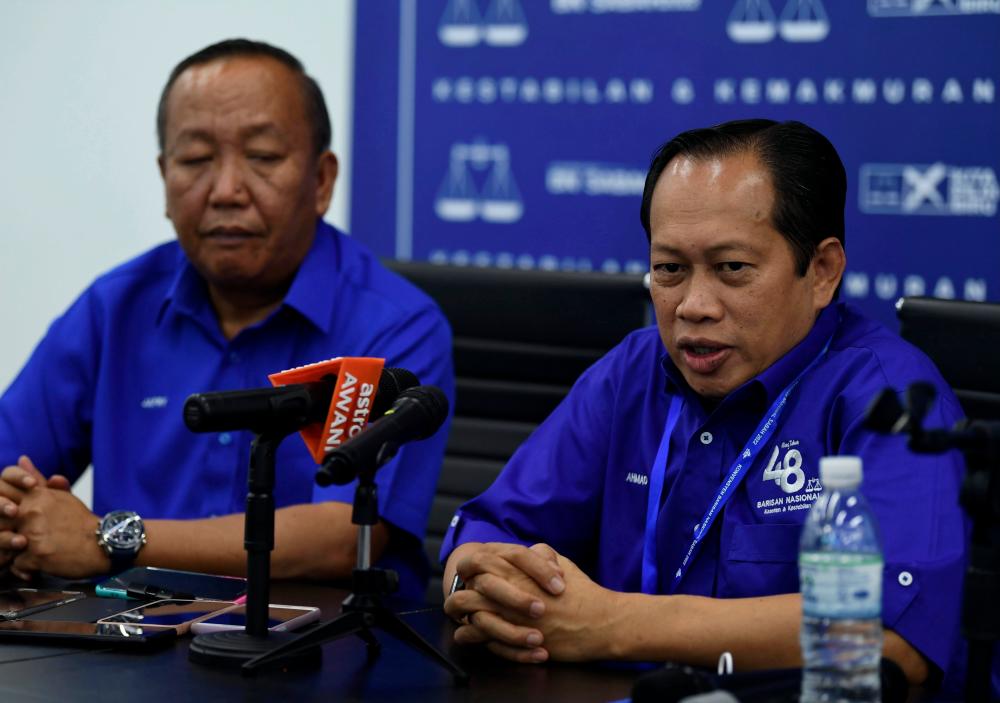 KOTA KINABLAU, July 2 - UMNO secretary -general Datuk Seri Ahmad Maslan (right) during a press conference in conjunction with the Sabah Barisan Nasional Convention at the Penampang Commercial and International Center (ITCC) today. BERNAMAPIX