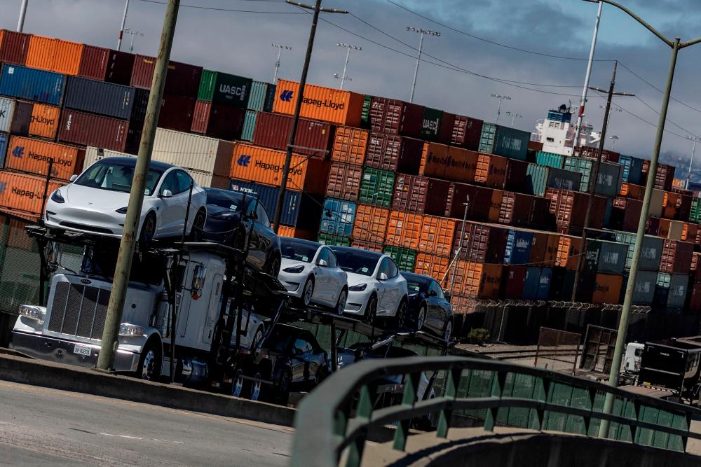Shipping containers are seen at a terminal inside the Port of Oakland in Oakland, California. The overall decline in exports reflects a strong dollar, driven by tighter monetary policy, and weakening global demand. – Reuterspix