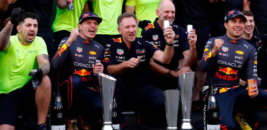 Red Bull's Max Verstappen (2nd left) and Sergio Perez (right) celebrate finishing first and second with team principal Christian Horner (centre) and the Red Bull team after the F1 Spanish Grand Prix at Circuit de Barcelona-Catalunya in Barcelona on May 22, 2022. – REUTERSPIX