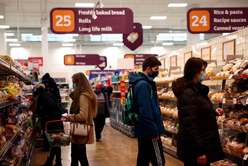 Shoppers look at bread in a Sainsbury’s supermarket, amid the coronavirus disease (Covid-19) outbreak, in London, Britain January 12, 2021. REUTERSpix