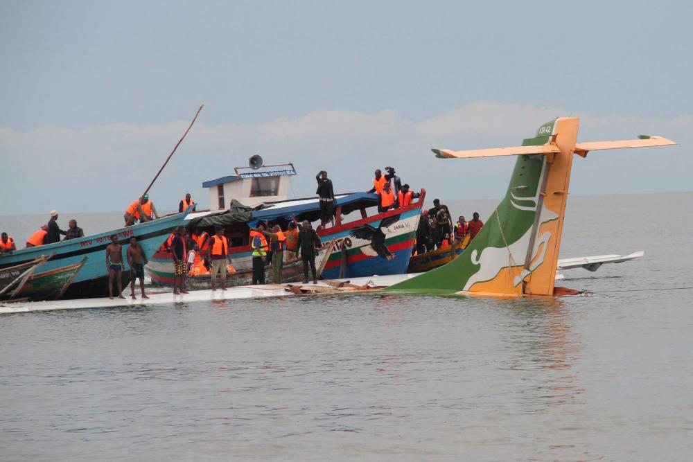 Rescuers search for survivors after a Precision Air flight that was carrying 43 people plunged into Lake Victoria as it attempted to land in the lakeside town of Bukoba, Tanzania/AFPPix