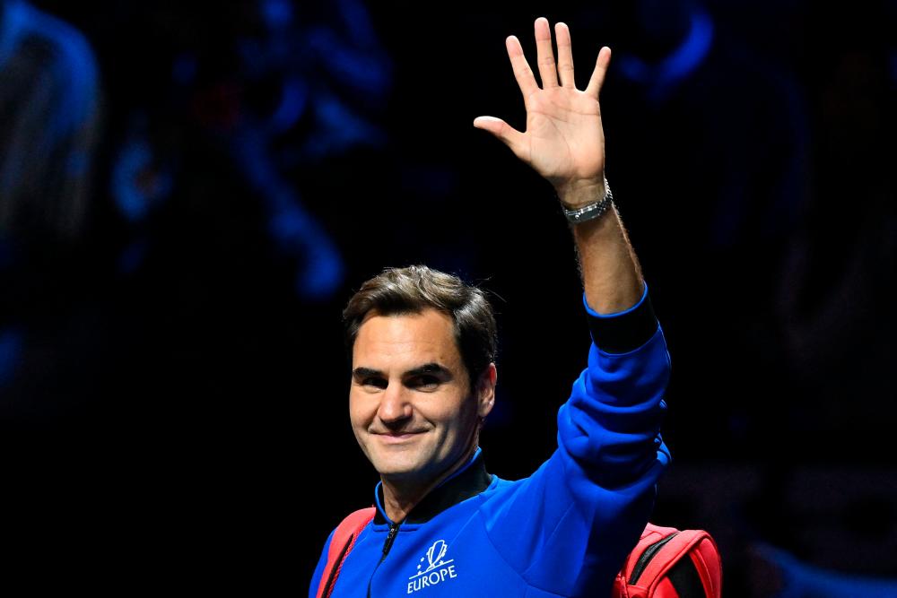 Switzerland’s Roger Federer waves after a practice session ahead of the 2022 Laver Cup at the O2 Arena in London on September 22, 2022. AFPPIX