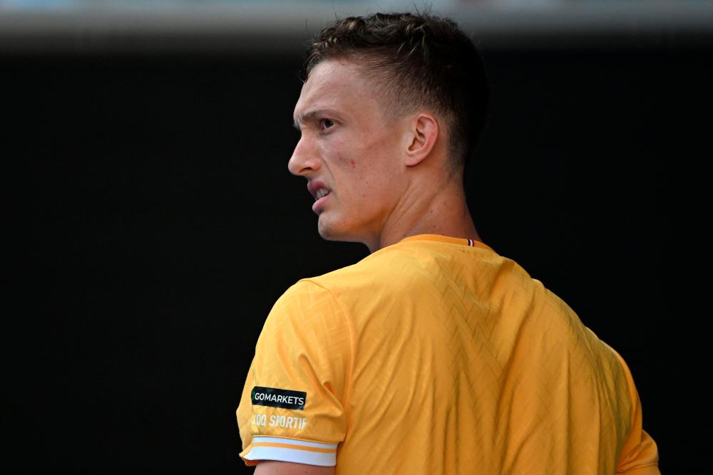 Czech Republic’s Jiri Lehecka reacts as he plays against Canada’s Felix Auger-Aliassime during their men’s singles match on day seven of the Australian Open tennis tournament in Melbourne on January 22, 2023. AFPPIX