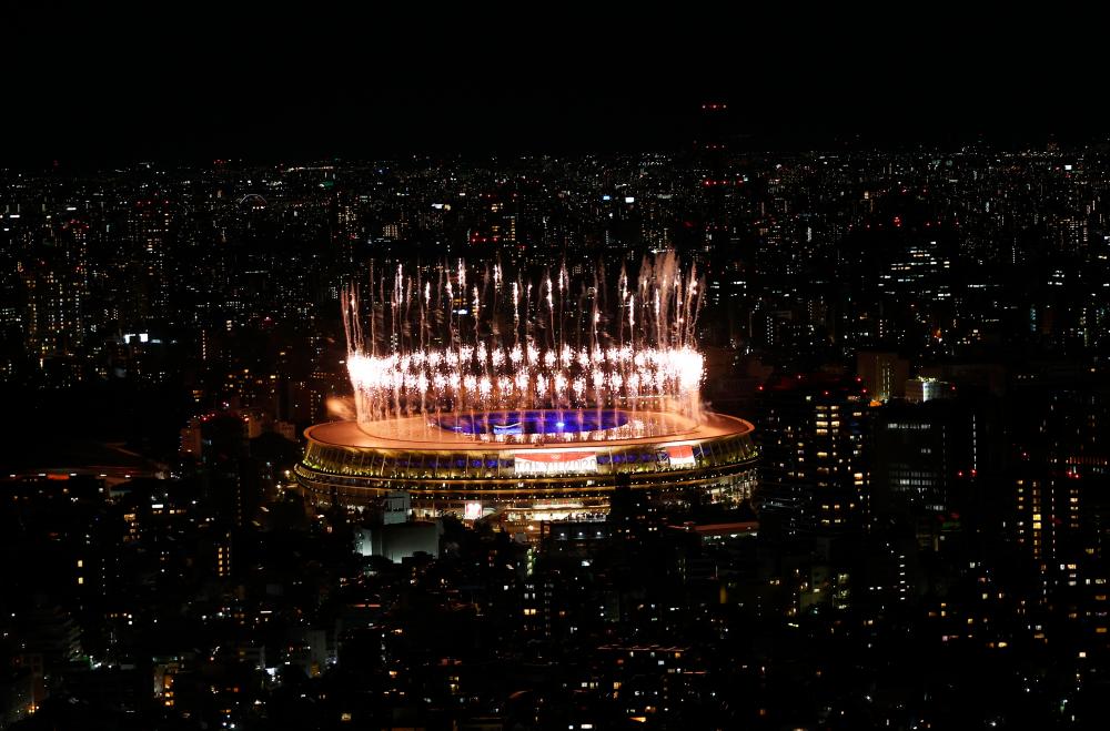 Fireworks are seen from outside the stadium during the closing ceremony from the Shibuya Sky observation deck. REUTERSPIX