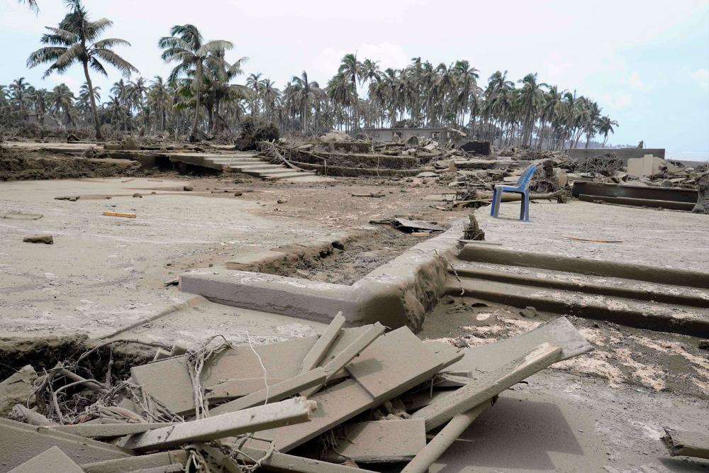 This photo taken on January 16, 2022 shows destroyed beach resorts in the Hihifo district of Tonga’s main island Tongatapu following the January 15 eruption of the nearby Hunga Tonga-Hunga Ha’apai underwater volcano. AFPPIX