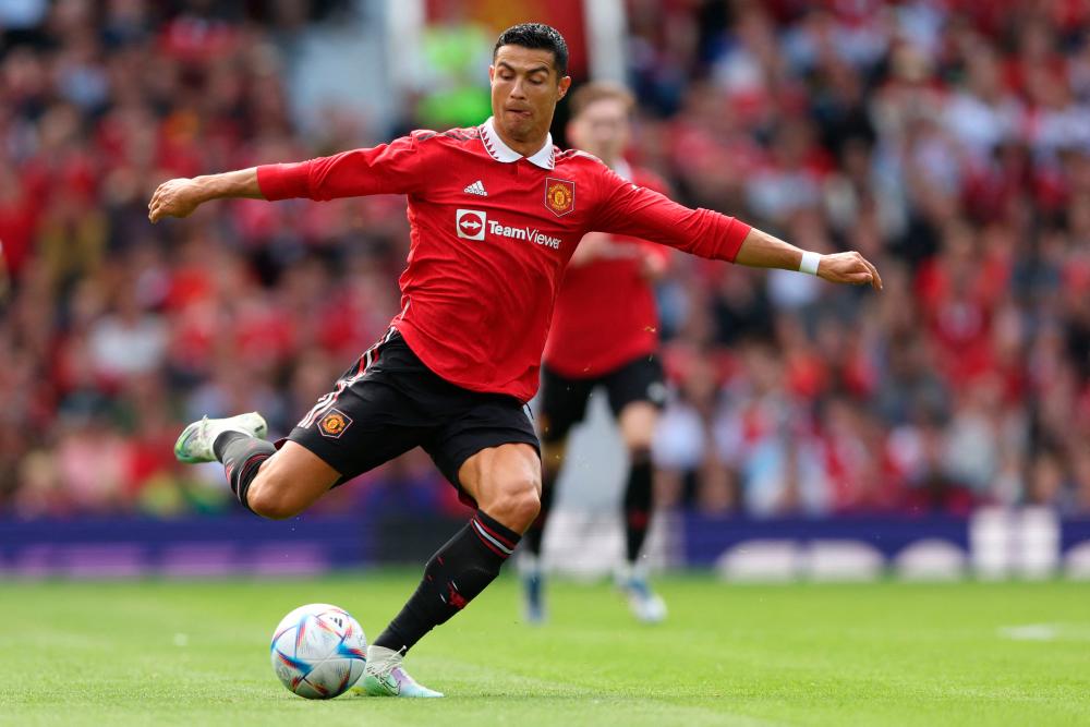 Manchester United’s Portuguese striker Cristiano Ronaldo passes the ball during a pre-season club friendly football match between Manchester United and Rayo Vallecano at Old Trafford in Manchester, north west England, on July 31, 2022. AFPPIX