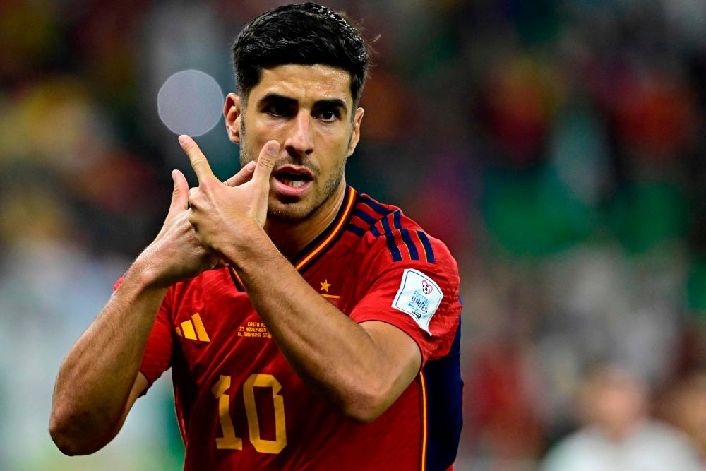 Spain’s forward #10 Marco Asensio reacts after scoring the second goal during the Qatar 2022 World Cup Group E football match between Spain and Costa Rica at the Al-Thumama Stadium in Doha on November 23, 2022. AFPPIX