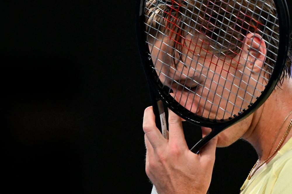 USA’s Sebastian Korda reacts after a point against Russia’s Karen Khachanov during their men’s singles quarter-final match on day nine of the Australian Open tennis tournament in Melbourne on January 24, 2023. AFPPIX