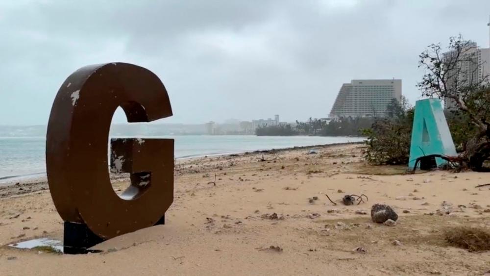 This video capture from James Reynolds’ Twitter page @EarthUncutTV shows the giant letters spelling GUAM, a tourist spot on the beach, damaged by high winds and precipitation a day after Typhoon Mawar passed over Tumon Bay, Guam, May 25, 2023. AFPPIX