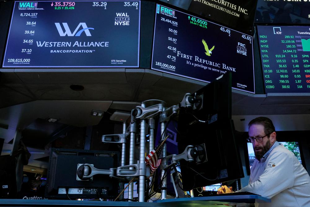 Traders work on the floor of the New York Stock Exchange on Tuesday, March 14, 2023. – Reuterspic