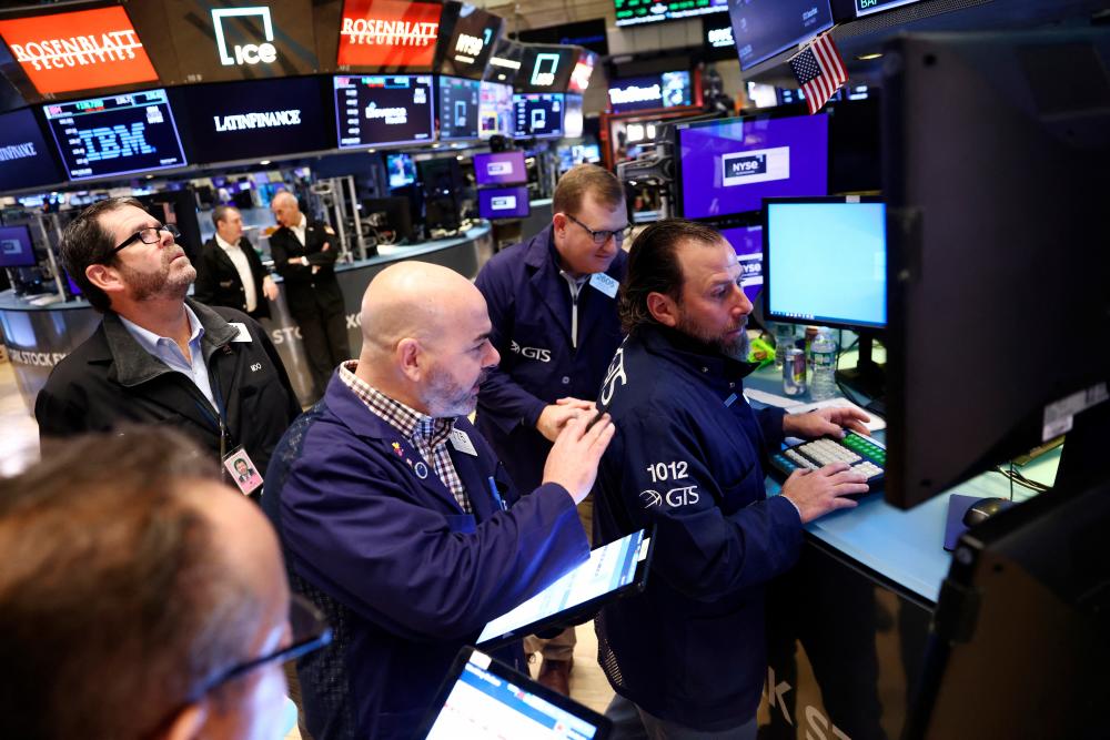 Traders working on the trading floor at the New York Stock Exchange on Thursday. – Reuterspic
