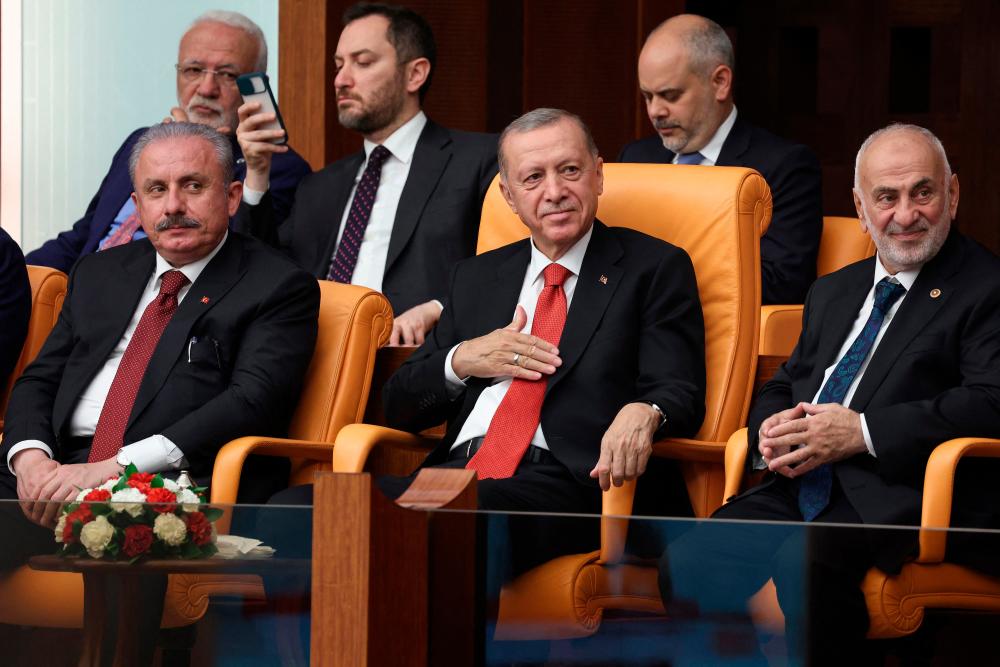 Turkish President Recep Tayyip Erdogan gestures during the 28th term deputies’ oath-taking ceremony at the Turkish Grand National Assembly in Ankara, on June 02, 2023. AFPPIX