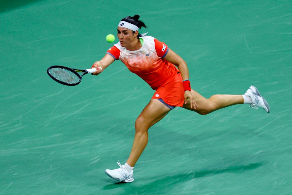 Tunisia's Ons Jabeur in action during her semifinal match against France's Caroline Garcia/REUTERSPix