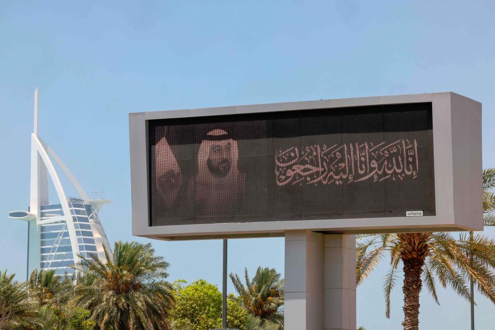 A billboard displays the portrait of late UAE’s President Sheikh Khalifa bin Zayed Al-Nahyan in the Emirate of Dubai. - AFP