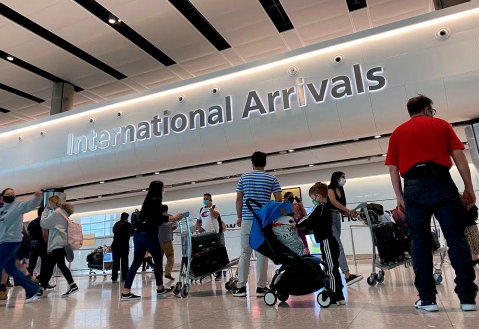 Passengers from international flights arrive at Heathrow Airport, following the outbreak of the coronavirus disease (COVID-19), London, Britain, July 29, 2020. REUTERSPIX