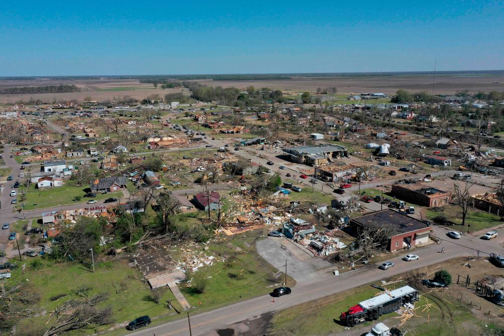 ROLLING FORK, MS - MARCH 25: In an aerial view, damage from a series of powerful storms and at least one tornado is seen on March 25, 2023 in Rolling Fork, Mississippi. AFPPIX