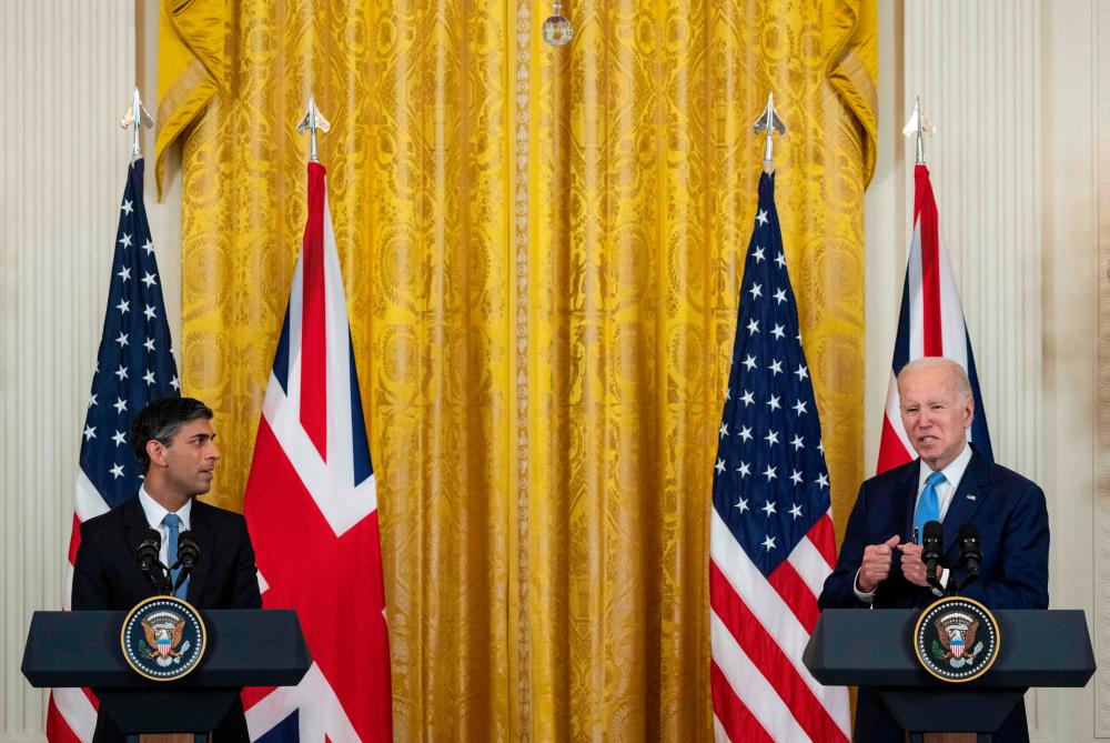 US President Joe Biden and British Prime Minister Rishi Sunaka hold a joint-press conference in the East Room of the White House in Washington, DC, on June 8, 2023. AFPPIX