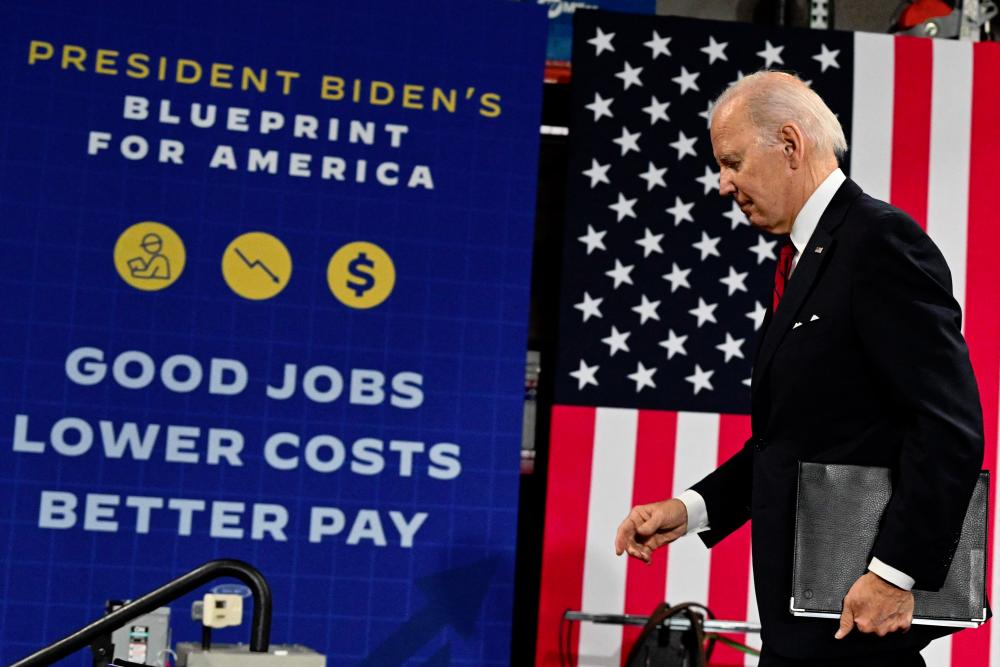 Biden departs after speaking about the economy at Steamfitters Local 602 in Springfield, Virginia, on Thursday. Biden says he will veto any Republican legislation that threatens to sow ‘chaos’ in the US economy. – AFPpic