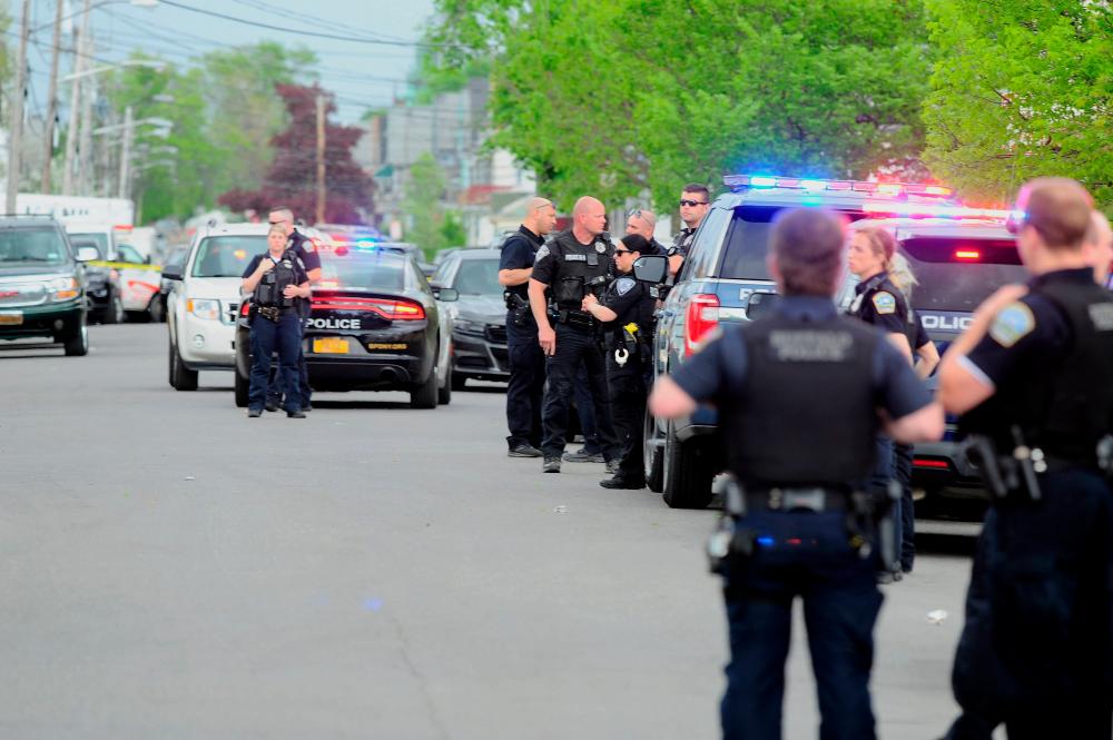 BUFFALO, NY - MAY 14: Buffalo Police on scene at a Tops Friendly Market on May 14, 2022 in Buffalo, New York. AFPPIX