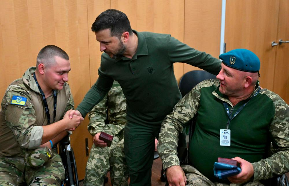 Ukrainian President Volodymyr Zelensky visits with wounded Ukrainian soldiers at the Staten Island University Hospital in the Staten Island borough of New York City on September 18, 2023. AFPPIX