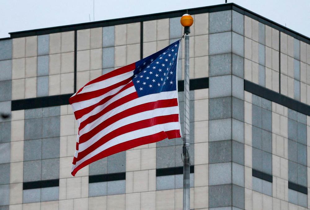 A flag waves in the wind at the US embassy in Kyiv, Ukraine, January 24, 2022. REUTERSpix