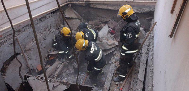 This handout picture taken and released by Uzbekistan’s Ministry of Emergency Situations on January 30, 2023 shows rescuers working at the site of a gas explosion in a residential building in Nukus/AFPPix