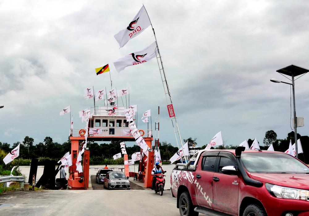 GPS flags fly high at the Marudi Ferry terminal. The relative absence of opposition flags and posters in rural constituencies is telling. Bernamapix